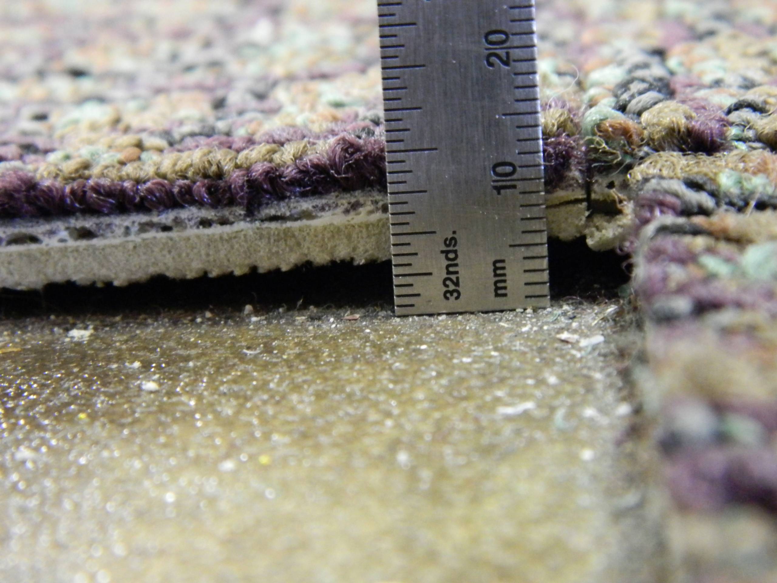 Carpet Tile Curling causes and Solutions At Floor Detective