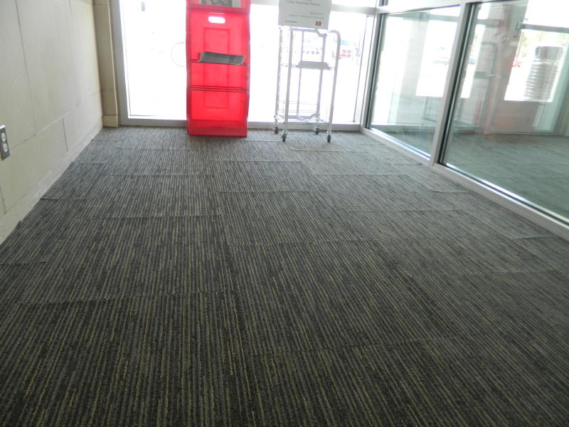 Carpet Tile Curling causes and Solutions At Floor Detective
