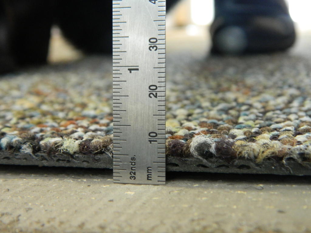 Carpet Tile Curling causes and Solutions At Floor Detective