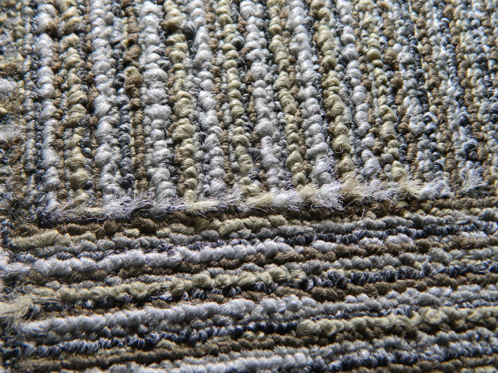 Why carpet tile edges are fuzzy and how to fix them at Floor Detective